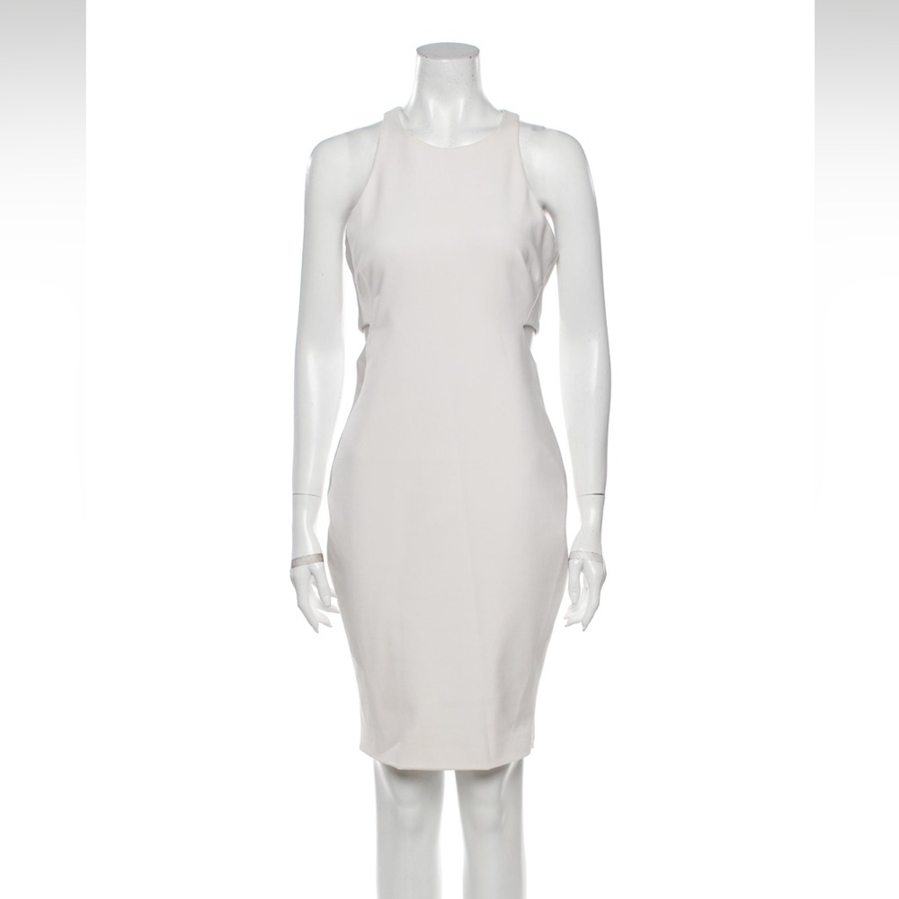 Elizabeth and James knee length dress with side cutouts.